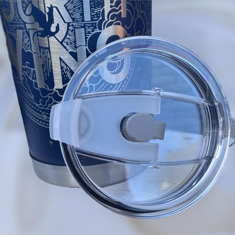 A 20 oz tumbler showcasing a design representing the four winds, identified as "fourth wing."