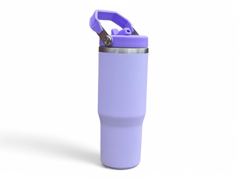 May include: A lavender stainless steel tumbler with a lid and a carrying handle. The tumbler has a matte finish.