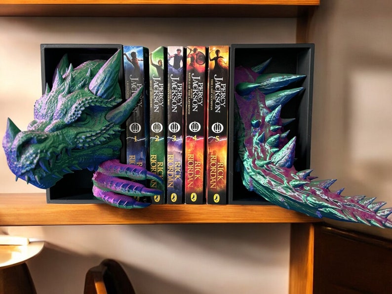 A dragon-themed bookend elegantly displaying a stack of books, merging artistic flair with a love for reading.
