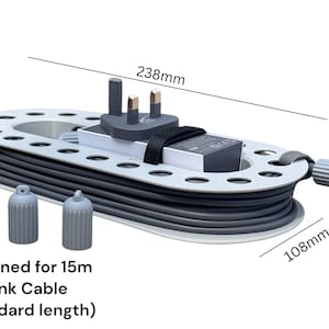 May include: A gray cable reel designed for a 15m Starlink cable. The reel is oval-shaped, with a white frame and a series of holes. It measures 9.4 inches long and 4.3 inches wide. Includes two gray cable end caps and a plug.