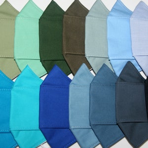 Blues/greens/black collection of solid/plain 3D origami style,all cotton,3 layer face masks. Easy breathe,fit and talk,non slip,comfortable.