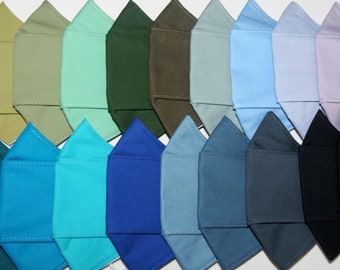 Colección de mascarillas faciales de 3 capas en azul, verde y negro, lisas o lisas, estilo origami 3D, totalmente de algodón. Transpiran, se ajustan y hablan fácilmente, son antideslizantes y cómodas.