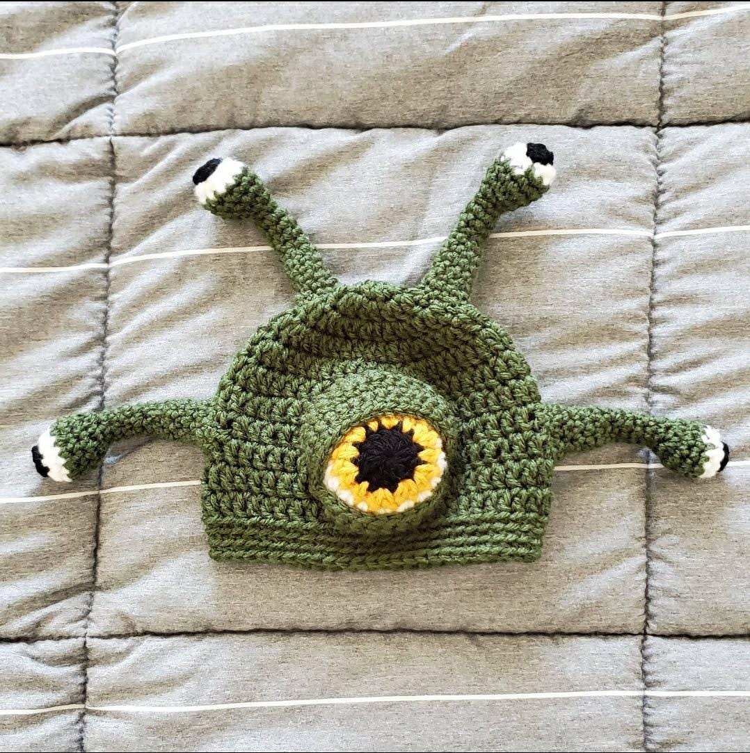 30 DnD Crochet Patterns for Dice Bags, Plushies, and Tabletop Gifts 19 Baby Eyebeast Hat Crochet Pattern