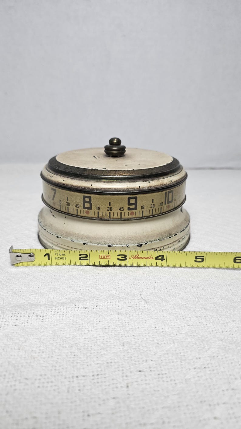 This is Vintage Lux Mystery Rotary Tape Measure Clock - Etsy