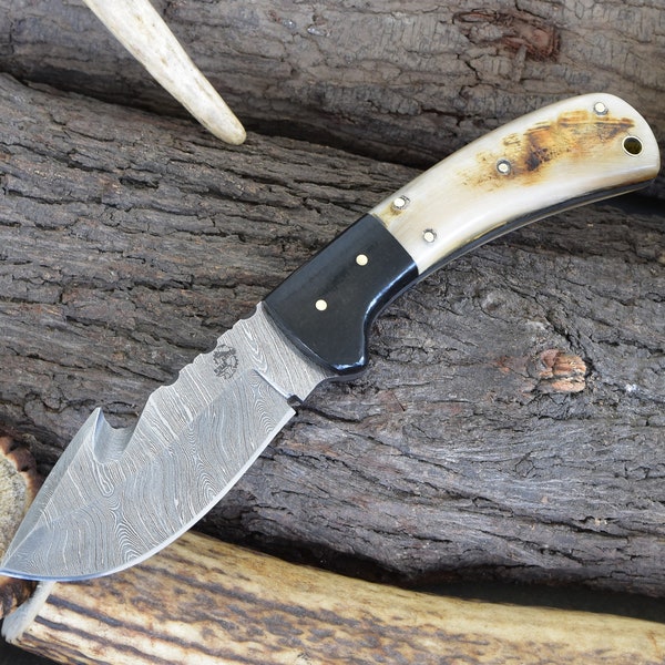 Custom Handmade Damascus Steel 8-1/2" Gut Hook Skinning Knife with Ram's Horn Handle & Dual Sheath (2048-RH)