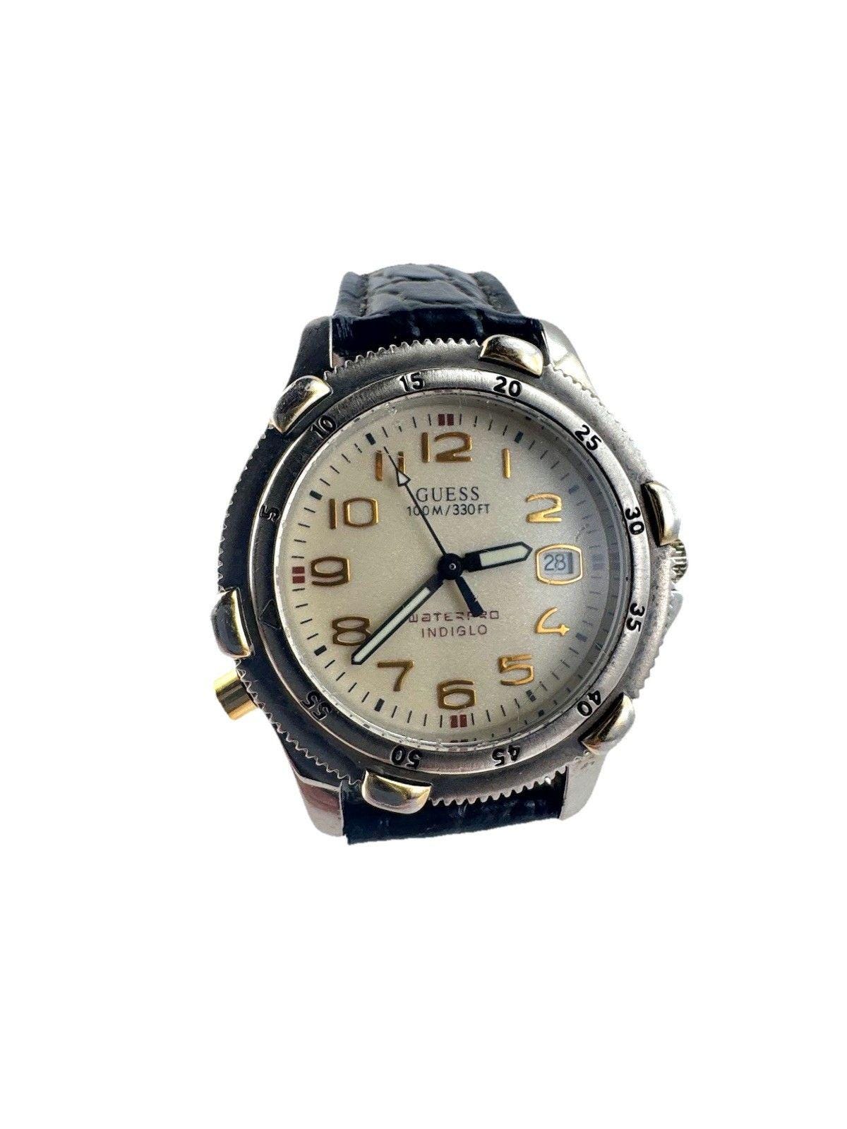 Rare Guess Quartz Watch Ladies Great Condition Glows Rotating Bezel New Battery Amazon.com: Guess Ladies 36mm Watch - Iridescent Strap  main image 4