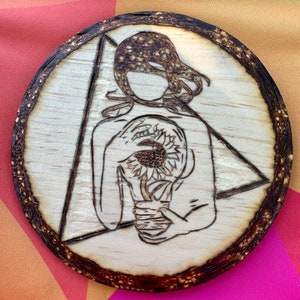 Stellar Illumination: The Sunflower&#39;s Glow - Wood Burned Pyrography Artwork