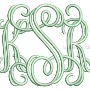 May include: A monogram with the letters K, S, and R in a green color. The letters are intertwined and have a decorative, cursive style.