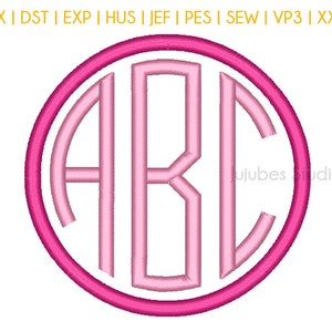 May include: A pink monogram with the letters A, B, and D in a circle with a thicker pink outline.