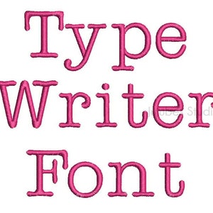 May include: Typewriter font in pink. The words "Type Writer Font" are written in a vintage typewriter font.