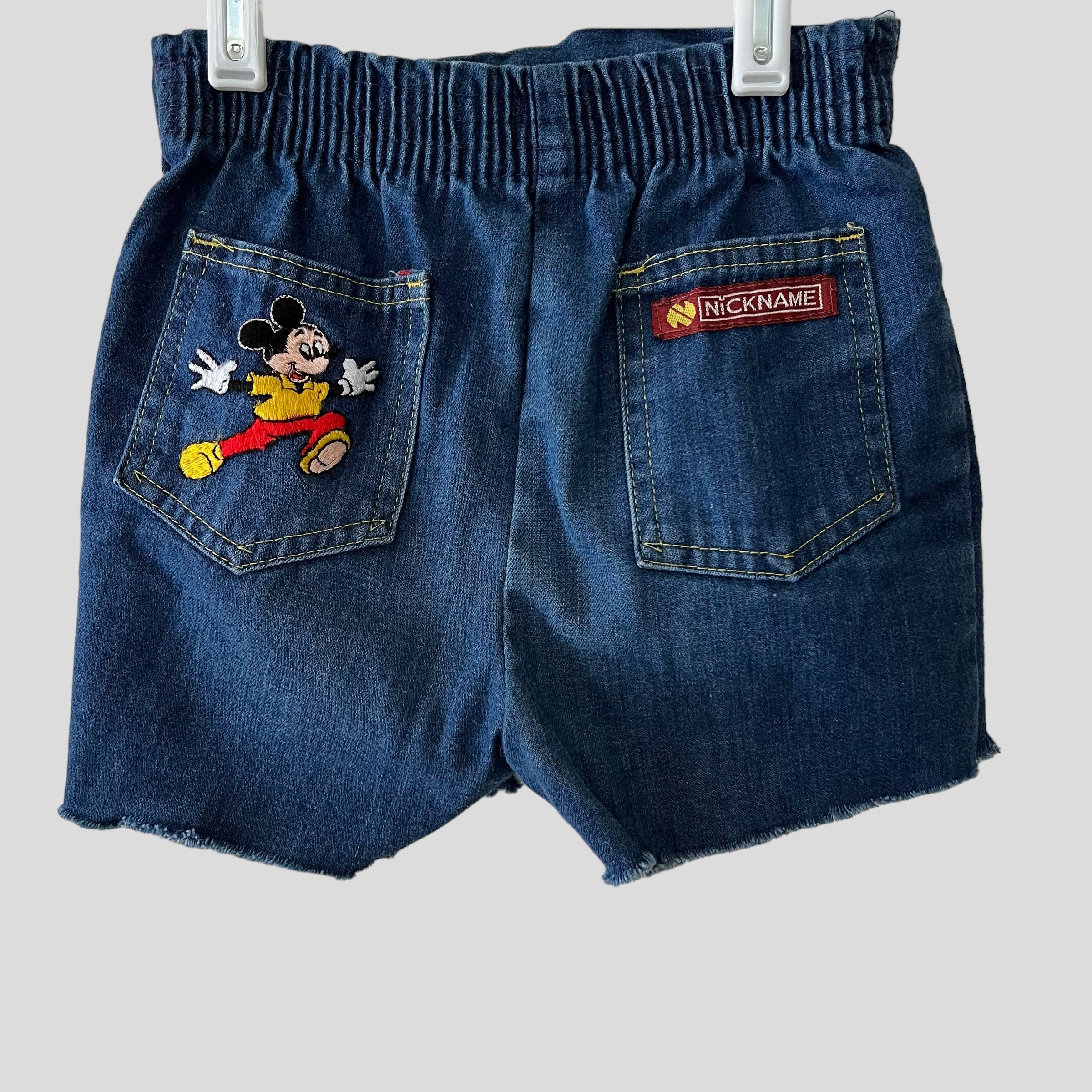 Jean shorts with mickey mouse sale