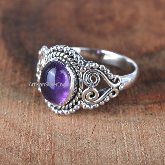 Wearing amethyst deals ring