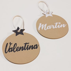 Christmas ball with personalized name to decorate the tree this Christmas