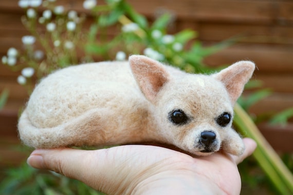A needle-felted, hand-sculpted miniature portrait of YOUR specific Chihuahua — this is pure 'I've never seen this before' gift energy.