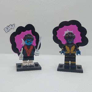 May include: Two blue and black superhero minifigures with a pink and black explosion graphic behind them. The minifigures are holding silver weapons and have a blue face with a black mask.