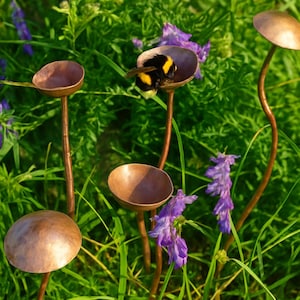Handmade Copper rain catcher garden ornament.