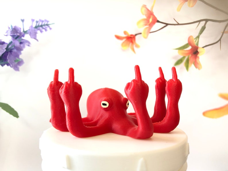 It is a 3D-printed red Fucktopus. A red octopus is fucking off with its five hands.
