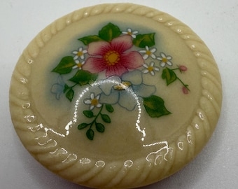Broche de porcelana Avon "Ramo de primavera" de 1984