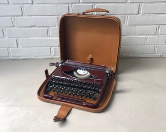 Vintage typewriter, Groma "Kolibri", GDR, portable typewriter with case and brush, decoration