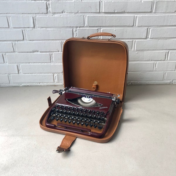 Vintage typewriter, Groma "Kolibri", GDR, portable typewriter with case and brush, decoration