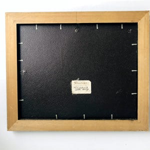 May include: A handmade wooden sign with the text "Welcome to our home" in a handwritten style. The sign is painted white with black lettering and a distressed finish, perfect for indoor or outdoor use.