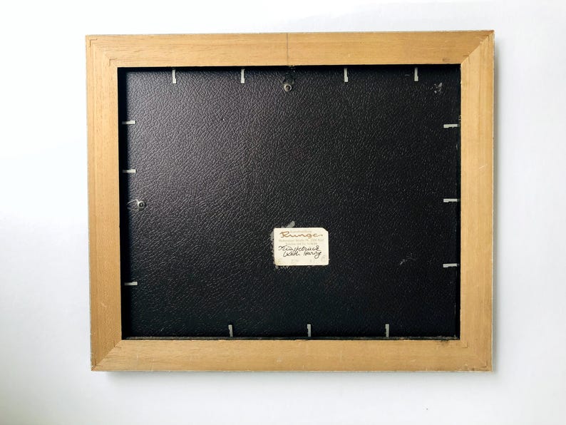 May include: A handmade wooden sign with the text "Welcome to our home" in a handwritten style. The sign is painted white with black lettering and a distressed finish, perfect for indoor or outdoor use.