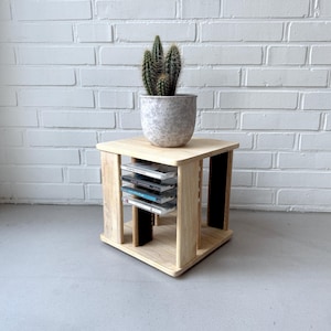 May include: A trio of ceramic mugs with a speckled, matte finish in light blue, cream, and grey. The mugs have a simple, modern design and a comfortable handle, perfect for tea or coffee.