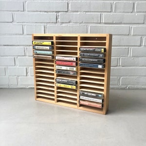 Rangement cassette audio dans boîtiers et rangements pour accessoire audio et vidéo