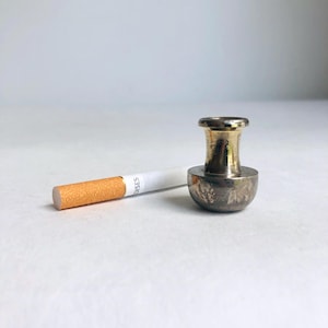 ember cigarette Close-Up of a Burning with Glowing for Health Awareness Campaigns 56429550 Stock Photo at Vecteezy Elevate your space with the timeless sophistication of Ember Products  Ember Smoke Products