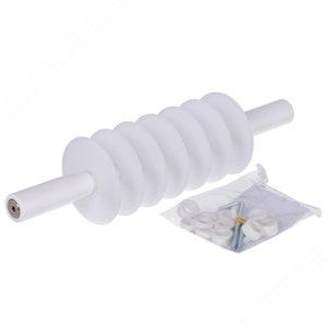 May include: A white, segmented rolling pin with a series of circular discs. The rolling pin has a handle on each end. A small clear plastic bag contains additional white discs, screws, and a small wrench.
