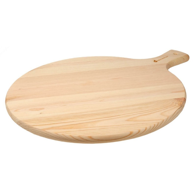 May include: A light-colored, round wooden pizza peel with a handle. The peel is made of light-colored wood with visible grain and a smooth surface. The handle is curved and has a small logo.