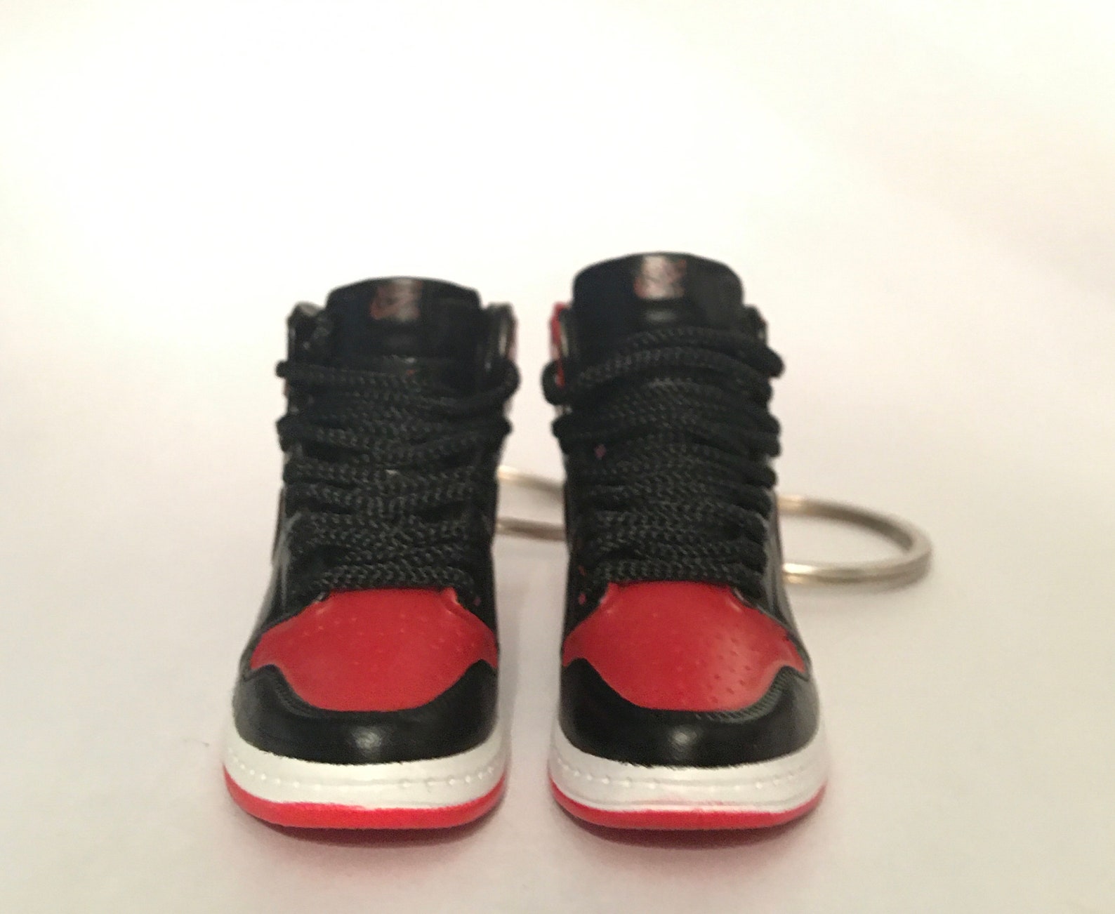 A pair of Nike Air Jordan keychains left & right foot Etsy