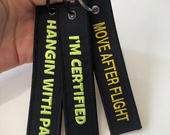 Llaveros bordados al por mayor, etiquetas de vuelo personalizadas, etiqueta de vuelo de piloto, avión, motocicleta, llavero de VUELO, llavero militar