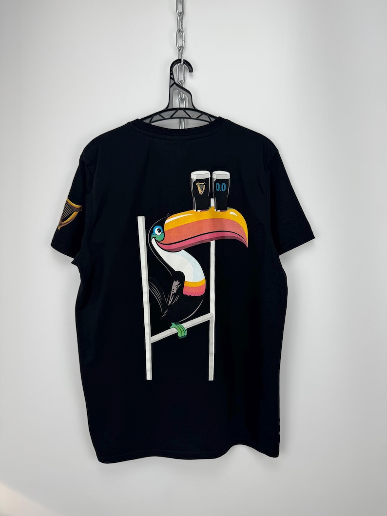 Guinness 0.0 T-shirt Herr Stor Svart Toucan Grafisk Öllogotyp Kortärmad bild 1