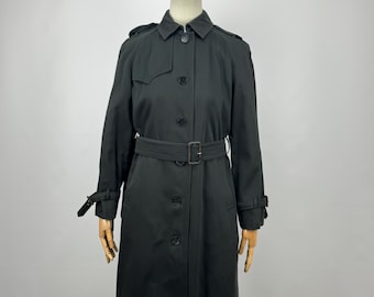Vintage Aquascutum of London zwarte lange trenchcoat met riem voor dames, maat 10