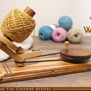 Enrouleur de fil en palissandre : accessoire de crochetage robuste
