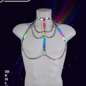 Genderless holographic harness displayed on a male mannequin with reflective rainbow tones and adjustable straps.