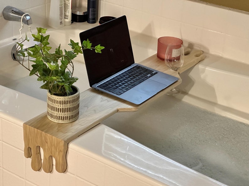 Bathtub caddy water fall design.