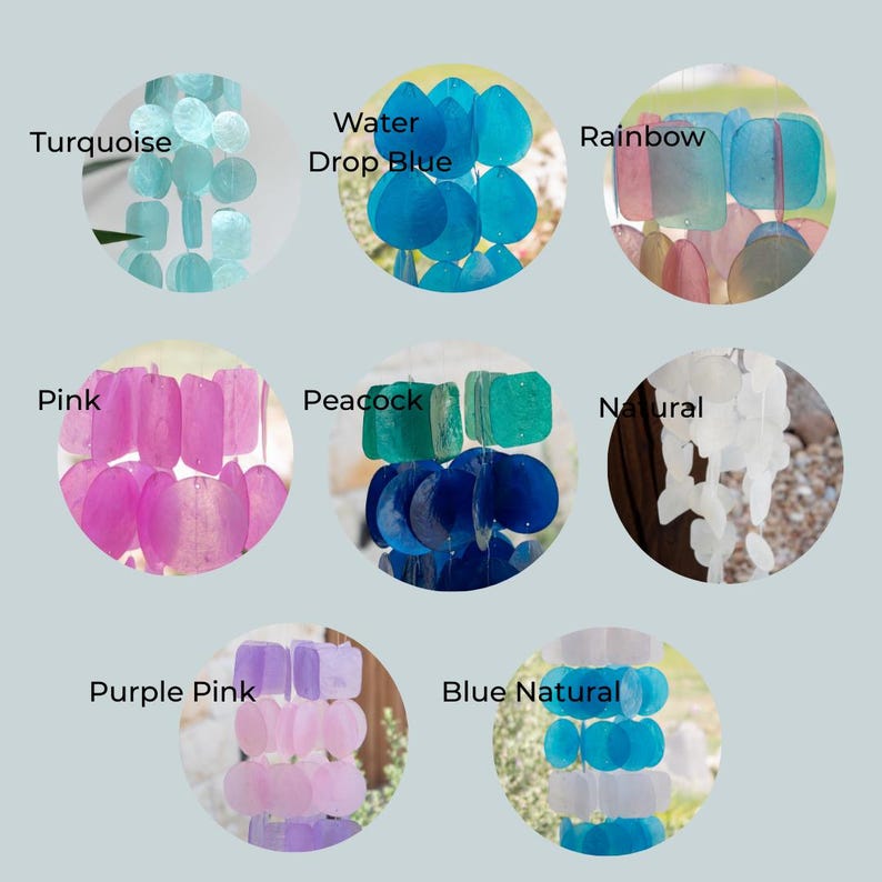 May include: A collection of colorful wind chimes in various shades, including turquoise, water drop blue, rainbow, pink, peacock, natural, purple pink, and blue natural. Each chime is made of shell-like pieces and labeled with its color.
