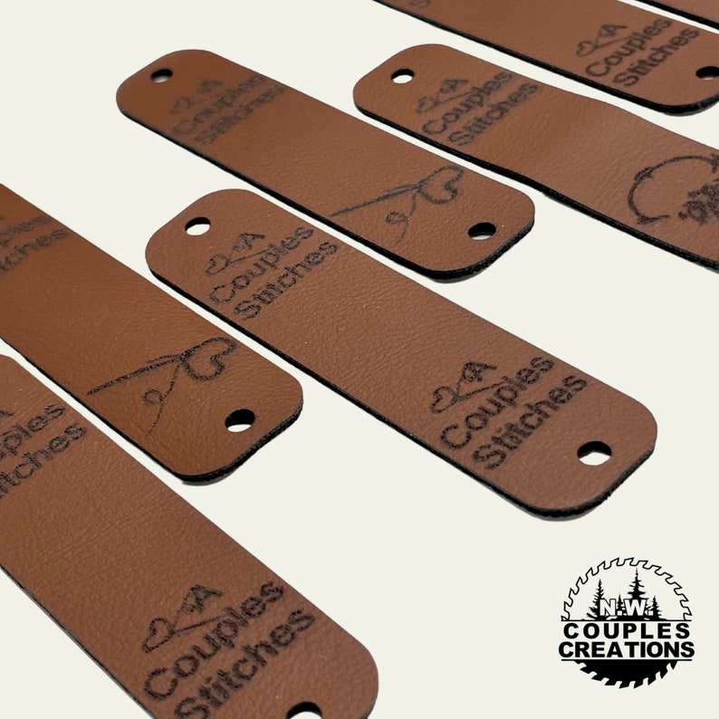 May include: A close-up of six brown leather tags with the text "Couples Stitches" and a stylized heart and needle design. The tags have a hole punched in the top. A circular logo with the text "N.W. Couples Creations" is in the bottom right corner.