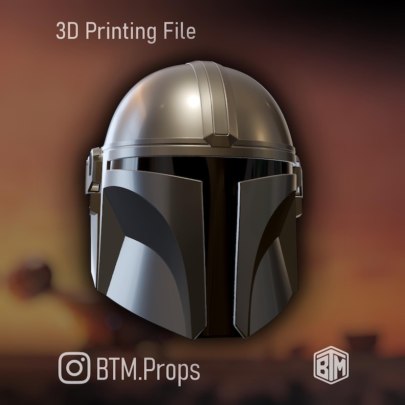 May include: A silver and black Mandalorian helmet, a 3D printing file. The helmet has a rounded top and angular faceplate. The text "3D Printing File" is at the top. The Instagram handle "BTM.Props" is at the bottom.