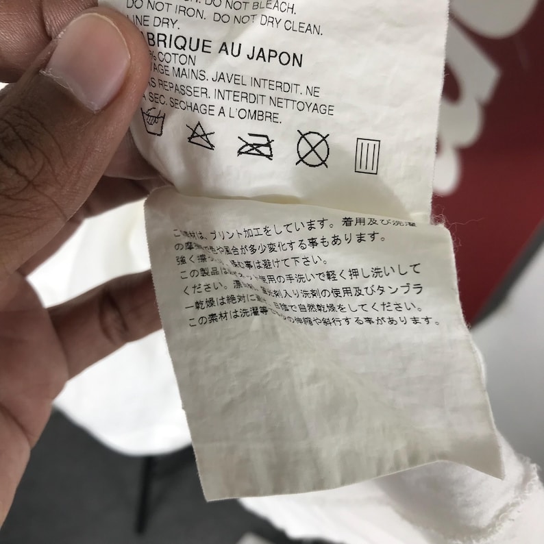 May include: A rustic wooden sign with the text "Welcome to our home" in white lettering. The sign features a distressed finish and a simple, inviting design, perfect for entryway decor.