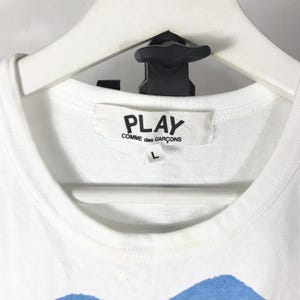 May include: A rustic wooden sign with the text "Welcome to our home" in white lettering. The sign features a distressed finish and a simple, inviting design, perfect for entryway decor.