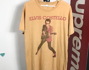 vintage thrashed Elvis Costello Burtal Youth sibger songwriter rocord band shirt
