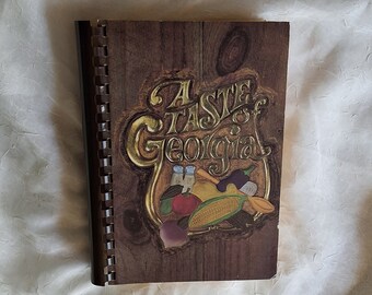 1994 A Taste of Georgia by Newnan Junior Service League/Collection of treasured recipes/Paperback-Plastic Spiral Comb 592 pgs plus Index