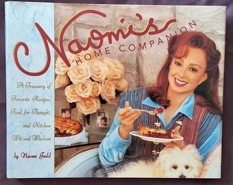 1997 *1.ª edición* Naomi's Home Companion/Un tesoro de recetas favoritas, alimentos para el pensamiento y sabiduría y sabiduría culinaria/Naomi Judd/HCDJ 214 pp.