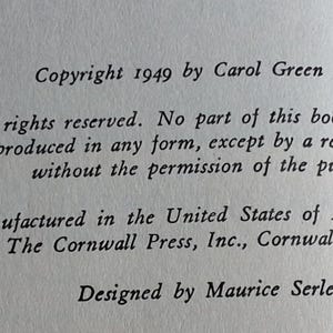 May include: Close-up of a printed page with text. The text includes copyright information from 1949 by Carol Green Wilson, manufacturing details from The Cornwall Press, and design credits to Maurice Serle Kaplan.
