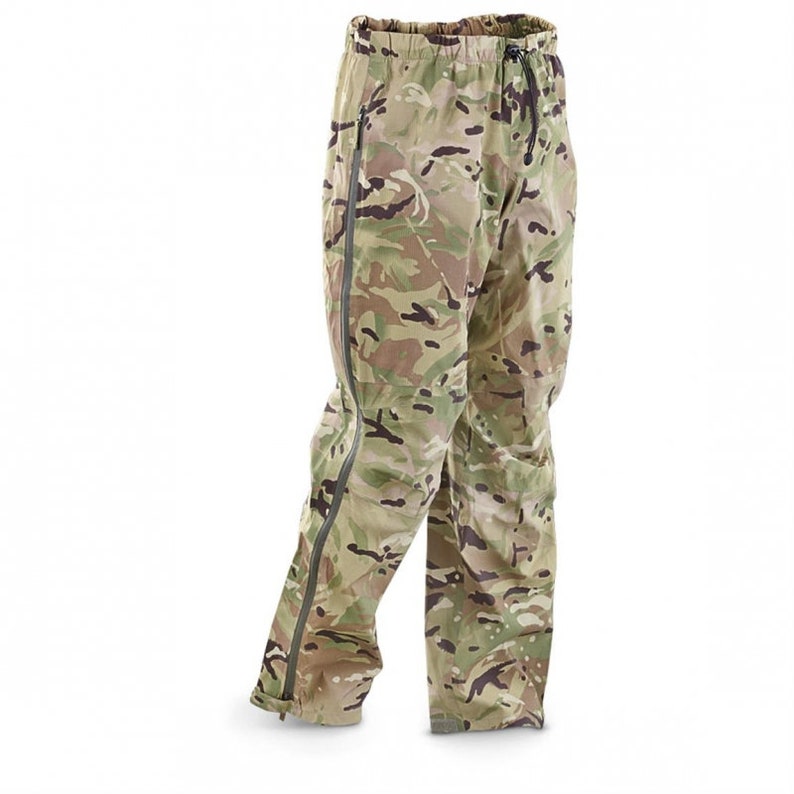 May include: Camouflage waterproof pants with a drawstring waist and zippered side seams.