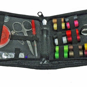 May include: A black zippered travel sewing kit with a variety of sewing supplies, including needles, thread, buttons, a thimble, scissors, and a tape measure.