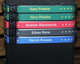 Cash's Personalised Luggage Straps - repeated name with motifs, 35mm wide, upto 2 metres long, slider lock buckle.